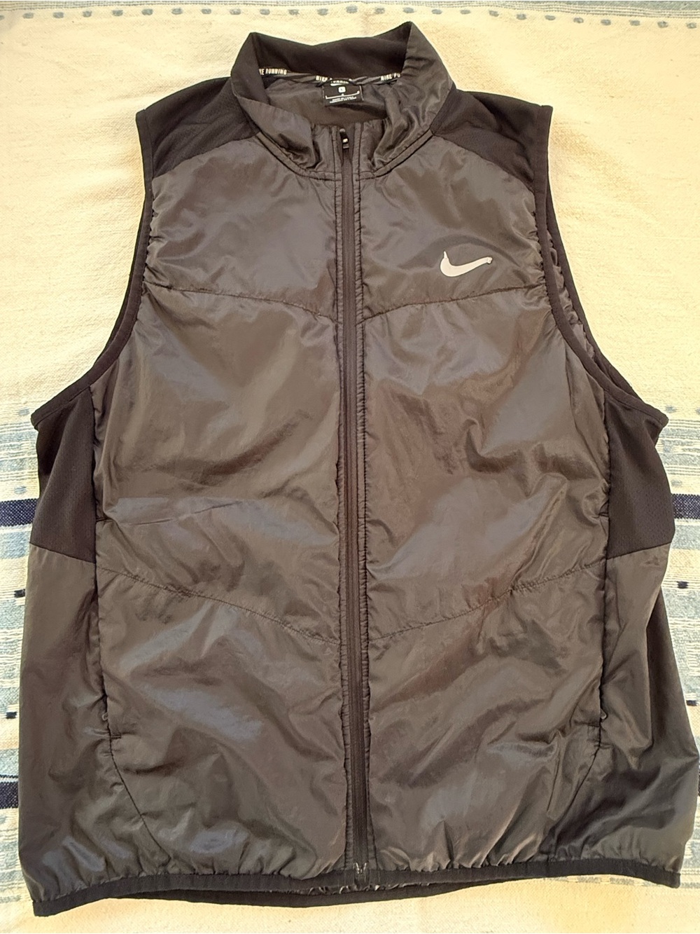 Nike Men's Black Quilted Sleeveless Vest with Reflective Swoosh